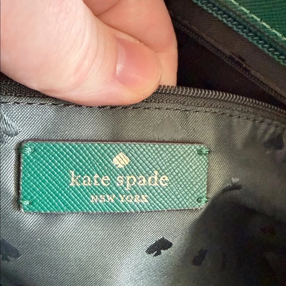 Kate Spade Brynn leather tote bag in the deep jade color with bow charm